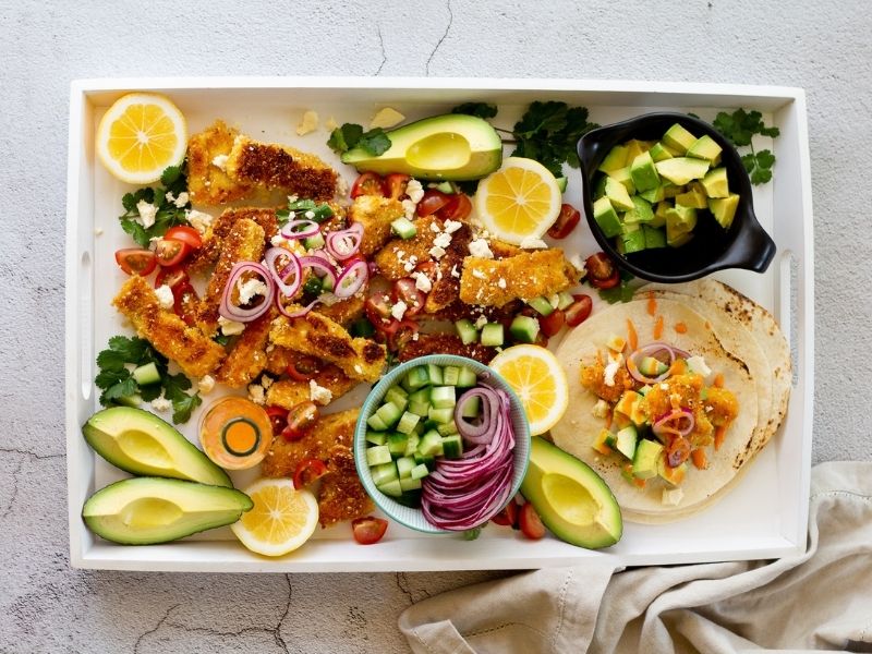 These Fish Tacos with creamy avocado and a killer spicy sauce new favourite dish